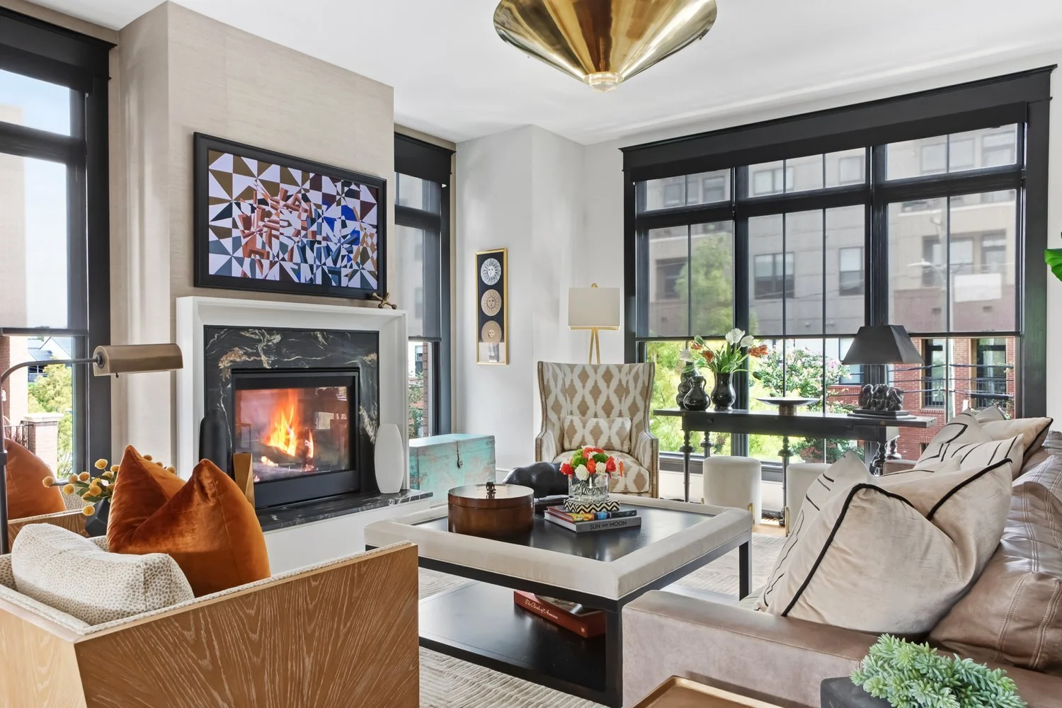Warm autumn interior with layered throws and soft lamplight